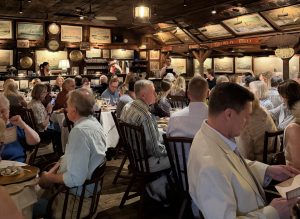 Guests enjoying dinner during the Gris 250 celebration.